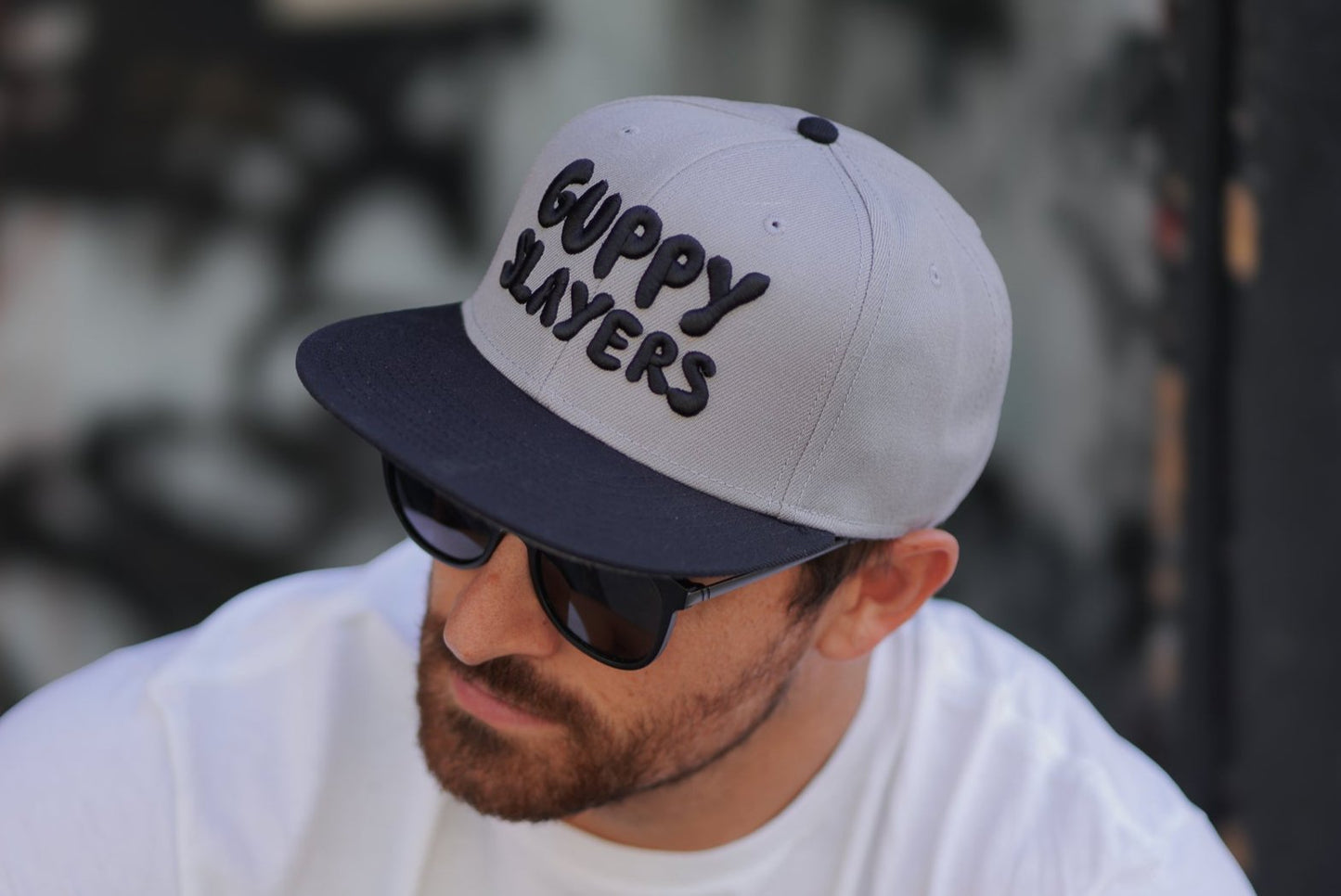 Guppy Slayers Snapback Hat